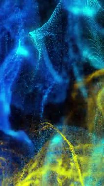 Siyah arkaplanda hareket eden parlak mavi ve sarı parçacık formlarının animasyonu. hareket, enerji ve biçim, soyut arayüz arkaplan kavramı dijital olarak oluşturulmuş video.