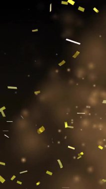 Koyu arkaplan üzerinde yüzen ve parlayan altın parçacıklar. Soyut, ışıltılı, ışıltılı, aydınlık, ruhani, sihirli