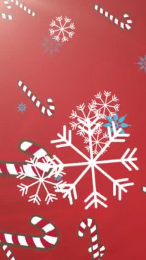 Kırmızı arka planda düşen kar taneleri ve mısır şekeri animasyonu. Noel, gelenek ve kutlama konsepti dijital olarak oluşturuldu.