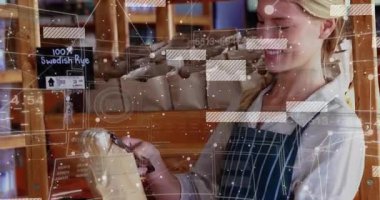 İsveç çavdar ekmeğini kapmak fırında denetim paketini dijital kaplama kontrol tazeliği kullanarak incelemek. Fırın, zanaatkar, köylü, modern, işçilik, tazelik, tüketici