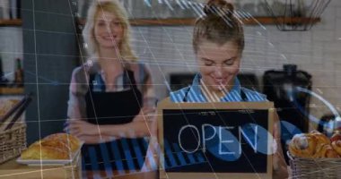 Personel karatahta OPEN işareti kaldırıyor ve canlandırılmış fırın grafiklerinin performans ölçümlerini artırdığını gösteriyor. Takım çalışması, konukseverlik, zanaat, markalaşma, verimlilik, modern, hoş geldin.