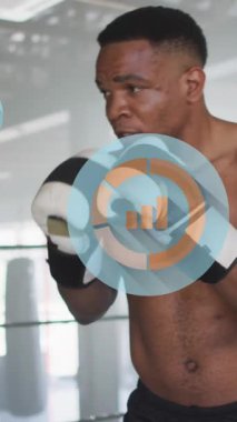 Afrika kökenli Amerikalı erkek boksörün ringde yumruk denemesi üzerine grafik simgelerinin canlandırılması. Dijital bileşik, çoklu pozlama, rapor, iş, spor ve yarışma konsepti.