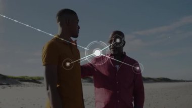 Kıdemli akıl hocası konuşuyor. Teknoloji ağı büyüdükçe boyuna kumsalda rehberlik ediyor. Bilgelik, bağlantı, rehberlik, samimiyet, evrim, teknoloji