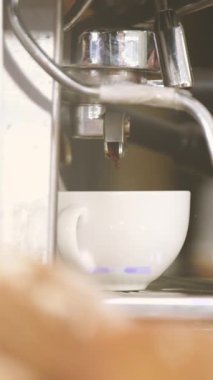 Animation of glowing moving lights over coffee machine. energy movement, coffee concept digitally generated video.