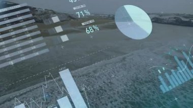 Sahilde HUD cisimleşiyor. Grafikler ve titreşim göstergeleriyle analitikleri görselleştiriyor. Veri görselleştirme, dijital arayüz, arayüz tasarımı, analitik, teknoloji, deniz, modern