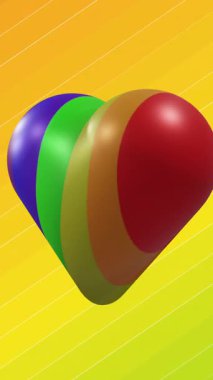 Animation of rainbow heart moving on colorful background. Valentine's day, love and celebration concept digitally generated video.