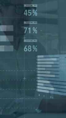 Animation of data processing over caucasian businessman using laptop at office. Global business, computing and digital interface concept digitally generated video.