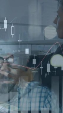 Animation of financial graphs over diverse women talking in office and caucasian male programmer. Business, working in office, finance and economy concept digitally generated video.
