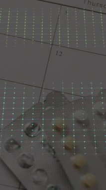 Hap ve takvim üzerine kardiyograf animasyonu. Küresel tıp, sağlık, bilim ve dijital arayüz kavramı dijital olarak oluşturulmuş video.