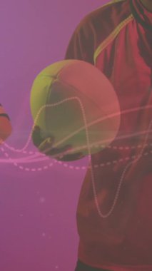 Animation of neon light trails over female rugby players on neon background. Sports and communication concept digitally generated video.