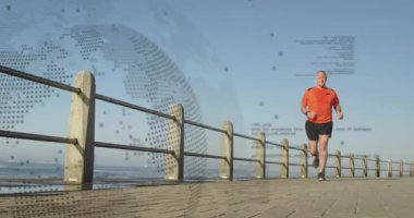 Üst düzey erkek koşucu koşu yolu, sağlık verilerinde izleme fitness ilerlemesinde zayıflayan dünya örtüsü. Fitness, zindelik, açık hava, sağlık, teknoloji, dayanıklılık, hareket