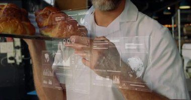 Pasta şefi, pastanenin kruvasan kalitesini yükseltirken hologram gramlarını aktifleştiriyor. Sanatçı, yenilik, dijital, gurme, aşçı, modern, sunum