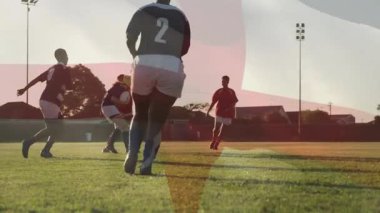 Futbol savunucusu, çapraz pas kılavuz kepçesini gösteren animasyonlu kaplama ile saldırganı işaretliyor. Atletik, rekabetçi, takım çalışması, strateji, açık hava, enerjik, dinamik