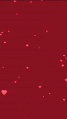 Kırmızı arka planda yüzen pembe kalp simgelerinin animasyonu. Sevgililer Günü, romantizm ve aşk konsepti dijital olarak oluşturulmuş video.