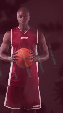 Basketbolcuya karşı covid 19 hücrenin animasyonu. covid 19 pandemik konsept sırasında dijital olarak üretilen video sporları.