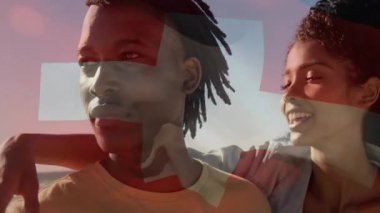 Bir kadın adamın kulağına fısıldıyor ve plajdaki sağlık reklamı için saydam bir kızıl haç animasyonu başlatıyor. Romantik, dinginlik, bağlantı, sevgi, uyum, refah, doğal