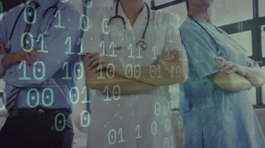İkili kod akışları statik sağlık ekibinin üzerine doğru sürükleniyor, dijital sağlık analizlerini gösteriyor. Sağlık, teknoloji, veri, yenilik, profesyonellik, tıp, görselleştirme