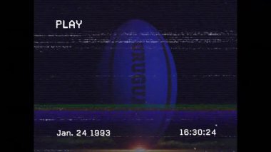 VHS oyunu ortaya çıkıyor, ayaklara vuruyor, rugby topu dönüyor, topu uçuruyor ve gücü gösteriyor. Dinamik, atletik, aksiyon, vintage, spor, yoğunluk, kinetik