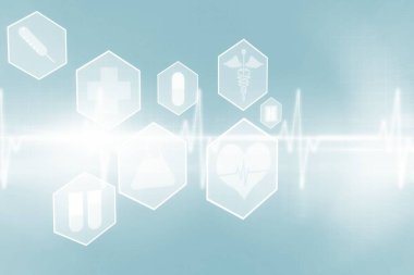 Tıbbi sembollerin dijital olarak birleştirilmiş görüntüsü mavi arkaplanlara karşı