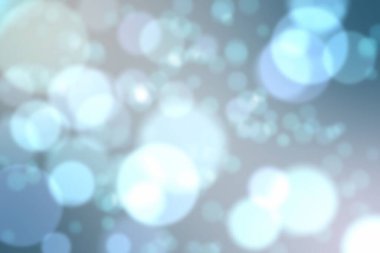 Soyut dijital illüstrasyon sessiz gri arkaplanda üst üste binen mavi-beyaz bokeh daireler gösteriyor. Geometrik, minimalist, modern, teknoloji, tasarım, sükunet, dinginlik