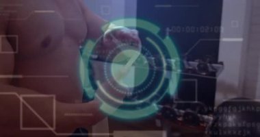 Spor salonundaki adam havluyu İ.K. zamanlayıcısı olarak tutuyor terini silmek için havluyu sayıyor ve katlıyor. Fitness, power, technology, performance, training, activewear, modern