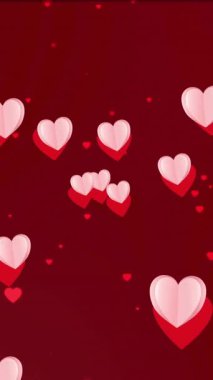 Kırmızı ve pembe kalplerin kırmızı arkaplanda ilerleyişinin animasyonu. Aşk, sevgililer günü, romantizm ve kutlama, dijital olarak oluşturulmuş video.