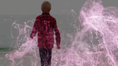 Çocuk, yükselen enerji iplikçiklerine görsel efektler için cevap veriyor, parlayan bir küre oluşturuyor. Fantezi, mistik, huzur, aydınlık, macera, hayal gücü, ruhani