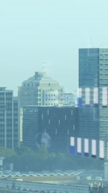 Animation of financial data processing over cityscape. Global business, finances, computing and data processing concept digitally generated video.