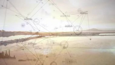 Başlangıçta ağ örtüsü gün batımında göl kıyısı bağlantı düğümlerinin üzerinde kayboluyor ve veri akışını gösteriyor. Gelecek, teknoloji, veri, bağlantı, soyut, dijital, görselleştirme