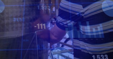 Turning valve, technician operating stainless steel tank at plant, with digital graphics overlay. Industrial, manufacturing, technology, machinery, analytics, teamwork, engineering