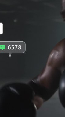 Spor salonunda yumruk pratiği yapan Afrikalı Amerikalı erkek boksör üzerine sosyal medya simgelerinin canlandırılması. Sosyal medya ağı ve spor fitness kavramı