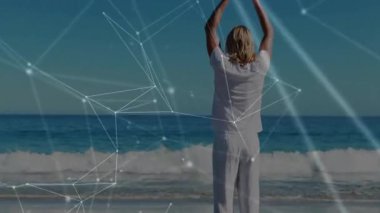 Adam nefes alıyor ve kollarını yukarı kaldırıyor. Sağlıklı olmak için dijital olarak üstüste bindiriyorlar. Meditasyon, farkındalık, sükunet, ahenk, dinginlik, maneviyat, teknoloji