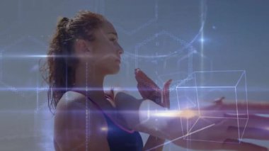 Holografik şekiller olarak kollarını esneten bir kadın jest kontrol tanıtımı için senkronize hareket ediyor. Fütürist, teknoloji, fitness, dijital, soyut, hareketli, canlı