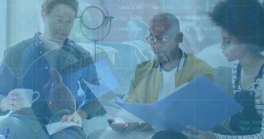 Reviewing charts with colleagues on sofa in casual lounge area, with blue folders and ring light. Collaboration, teamwork, analysis, communication, modern, professional, workspace