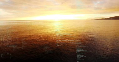 Glowing sun scattering golden reflection on ocean surface at dusk, with clouds and far coastline. Seascape, sunset, tranquility, nature, horizon, reflection, scenic