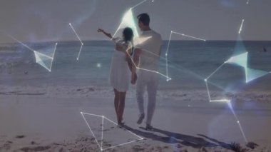 Kıyıda el ele tutuşan çift, ufuk çizgisini gösterip teknolojiyi çalıştırarak parlayan küreyi oluşturuyor. Romantik, bağlantı, yenilik, gelecek, uyum, dinginlik, keşif