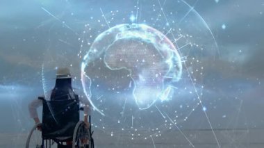 Tekerlekli sandalye kullanıcısı dijital dünya hologramını takip ediyor. Teknoloji verilerini analiz ediyor ve kollarını kaldırıyor. Erişilebilirlik, yenilik, teknoloji, bağlantı, keşif, güçlendirme, fütürist