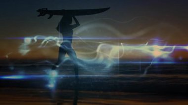 Surfing footage showing sunset causing light trails around surfer silhouette stepping toward shore. Adventure, serenity, motion, energy, twilight, minimalism, lifestyle