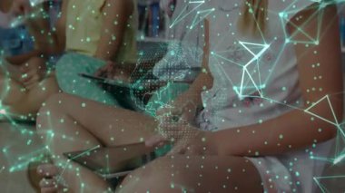 Classmates tapping tablets in education corner, activating green network showing connectivity. Children, technology, connectivity, learning, collaboration, education, digital