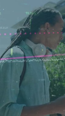 Animation of data processing over man using smartphone. Global cyber security, computing, digital interface and data processing concept digitally generated video.