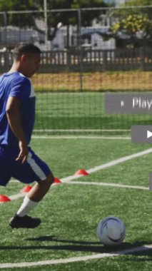 Animation of media icons over diverse male soccer players playing soccer at pitch. Global sport and digital interface concept digitally generated video.