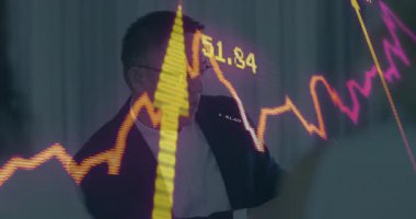 Male executive analyzing chart at opening while animated market graphs indicating shifts. Financial, corporate, business, analysis, strategy, professional, data