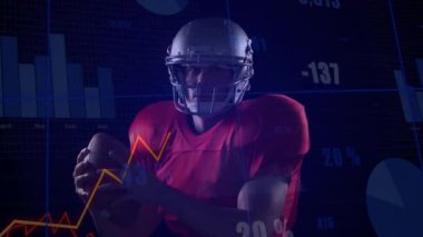 Erkek sporcu tutuşu ayarlıyor ve spor analitiği için veri tablolarına karşı hareket başlatıyor. Sporcu, veri görselleştirme, spor analitiği, hareket, rekabet, yenilik, performans