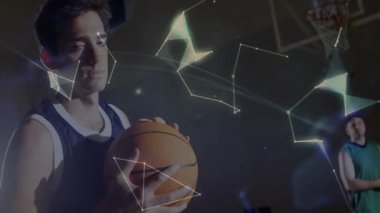 Mavi formalı oyuncu dünyayı oluşturan düğümlere odaklanırken takım arkadaşı spor istatistikleri gösteriyor. Dijital, geleceksel, teknolojik, yenilik, bağlantı, spor, takım çalışması