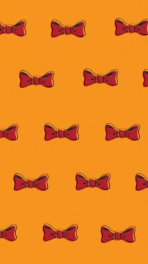 Turuncu arka planda süzülen papyonların animasyonu. elbiseler, şekiller ve hareket konsepti dijital olarak oluşturulmuş video.