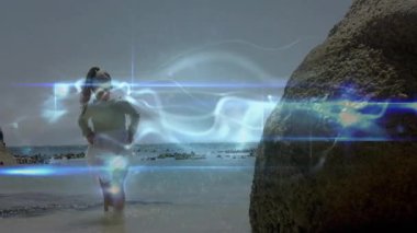 Çocuk animasyon mavi enerji dalgasını başlatıyor kayaları fırçalıyor ve teknoloji gösterisi için havuzu aydınlatıyor. Fantezi, ışıltı, macera, doğa, keşif, şakacı, gerçeküstü