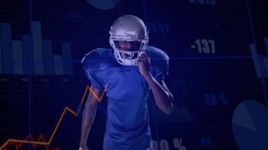 Futbolcu atölye ayarlama miğferiyle öne çıkıyor, spor analitiği örtülerini etkinleştiriyor. Sporcu, analitik, spor, teknoloji, performans, yenilik, fitness