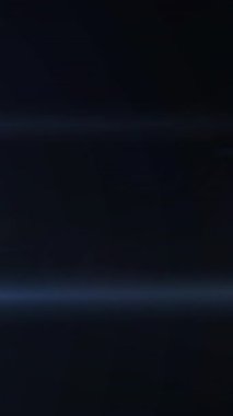 Siyah arkaplan üzerindeki ışık ve noktaların animasyonu. Noel, gelenek ve kutlama konsepti dijital olarak oluşturuldu.