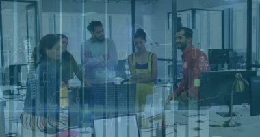 Discussing charts on monitors and printed documents by team members in open office with coffee mugs. Collaboration, teamwork, brainstorming, professional, modern, productivity, communication