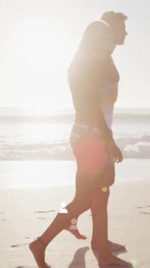 Kafkasyalı çiftin üzerinde yüzen birden fazla profil ikonlarının canlandırması. Sahilde birlikte yürüyorlar. Aşk ve ilişki kavramı